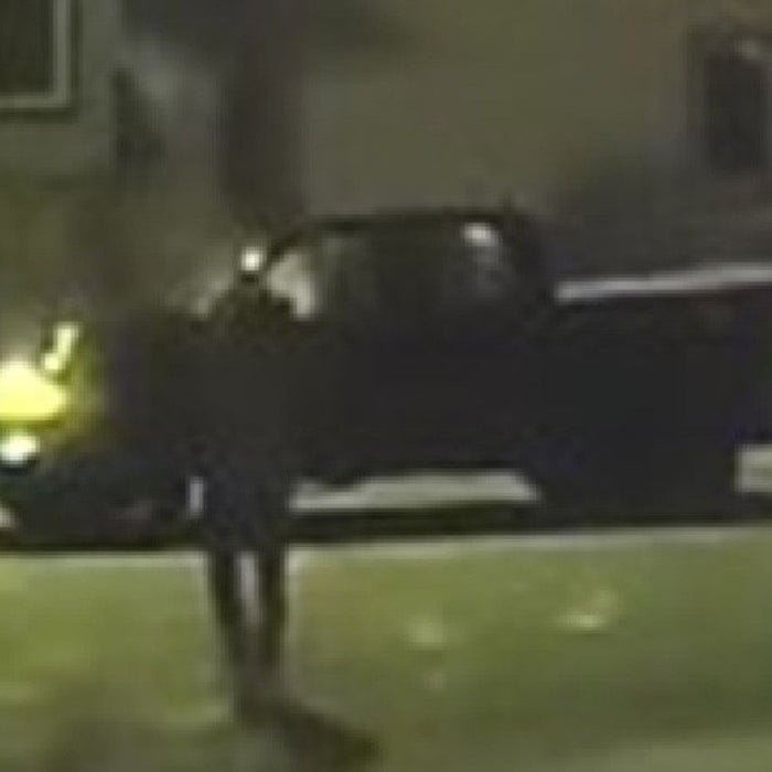 Dark pickup truck image released as part of an Edmonton Police Service appeal for video evidence