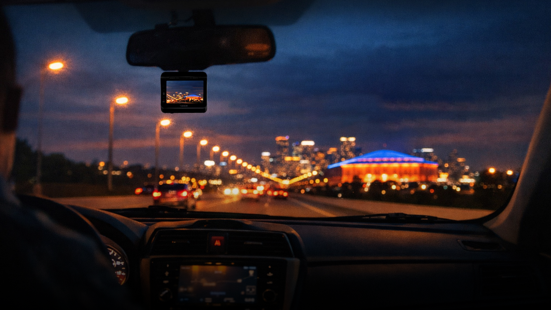 Night road trip through city traffic with dash cam protection
